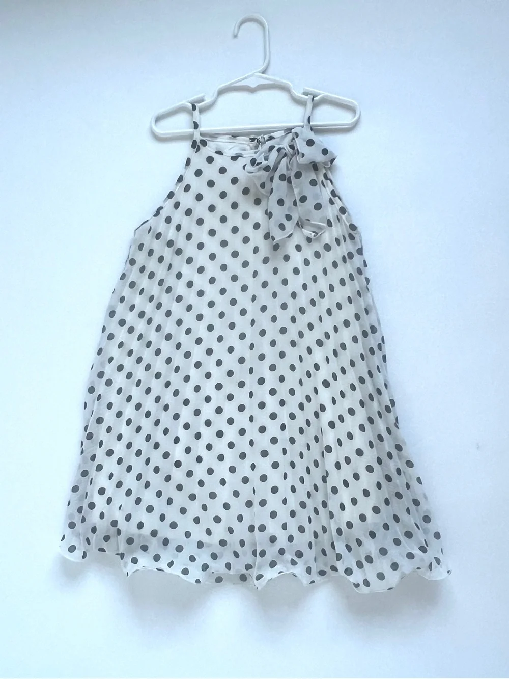 Girls White Polka Dot Bow Dress. Approximately 5/6 size